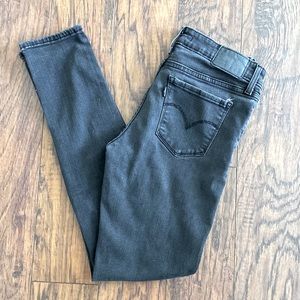 Levi’s black distressed 711 Skinny Jeans - 28